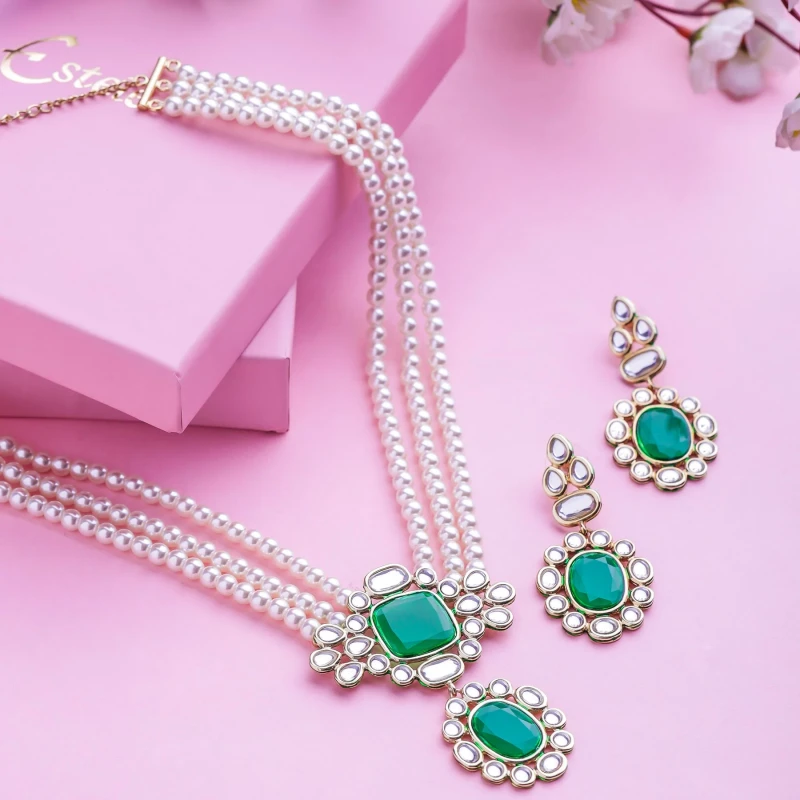 ZAVERI PEARLS Green Dazzling Stones Diamonds Bridal Layered Necklace Earring & Maangtikka Set For Women-ZPFK18212